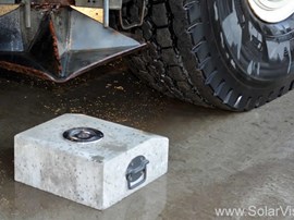 Testing of solar road stud with heavy truck